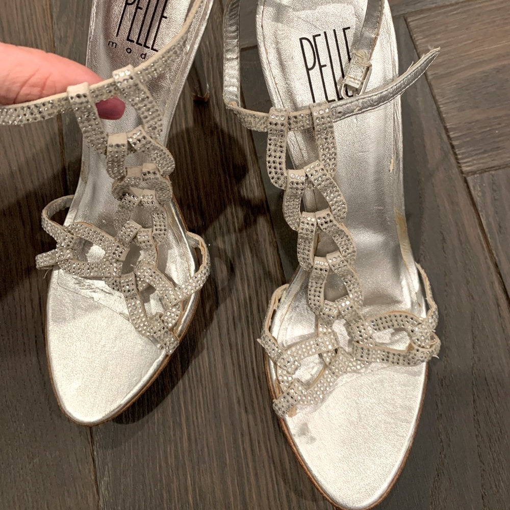 Silver embellished high heel sandal platforms.